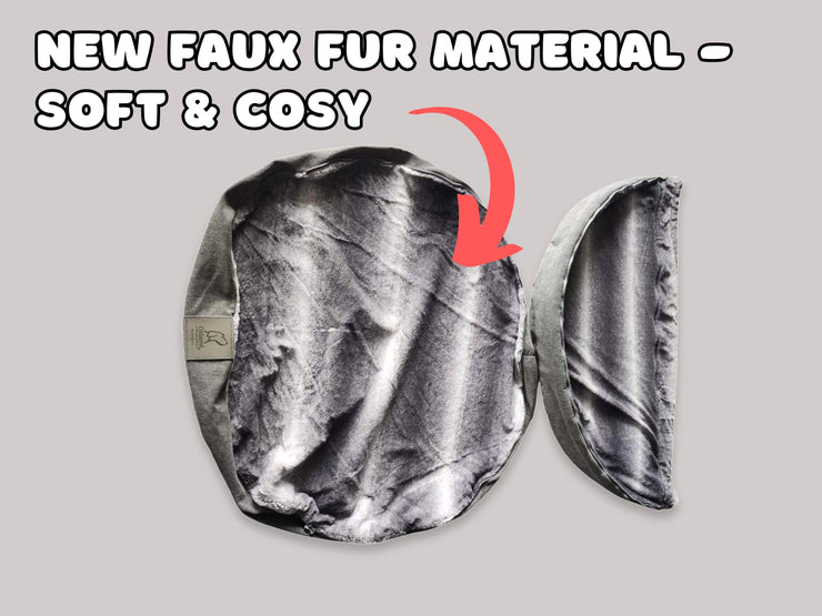 Open view of grey dog bed showing soft two-tone faux fur interior with removable hood