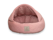 Empty Dusky Pink Quilted Velour Cocoon Dog Bed showing interior and hood design